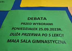 Plakat zapraszający na debatę.