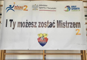 Plakat z napisem "I Ty możesz zostać Mistrzem 2". Element jest niedostępny cyfrowo.