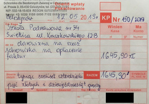 Pokwitowanie na wpłatę zebranych pieniędzy podczas loterii fantowej - tysiąc sześćset czterdzieści pięć złotych i dziewięćdziesiąt groszy.