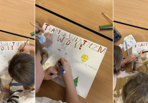 Pierwsza grupa dzieci przygotowuje plakat z tradycjami świątecznymi w Polsce.