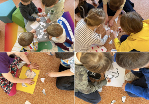 Uczniowie układają puzzle.