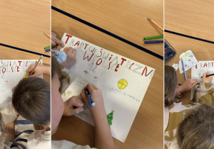 Pierwsza grupa dzieci przygotowuje plakat z tradycjami świątecznymi w Polsce.