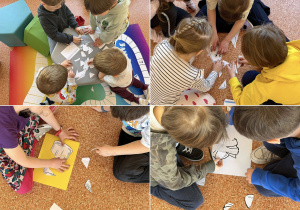 Uczniowie układają puzzle.